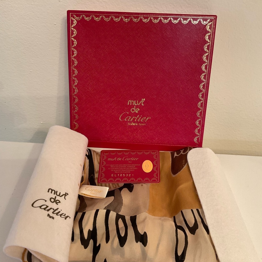 Must de Cartier scarf, original box, card of authentication. Like new, worn once